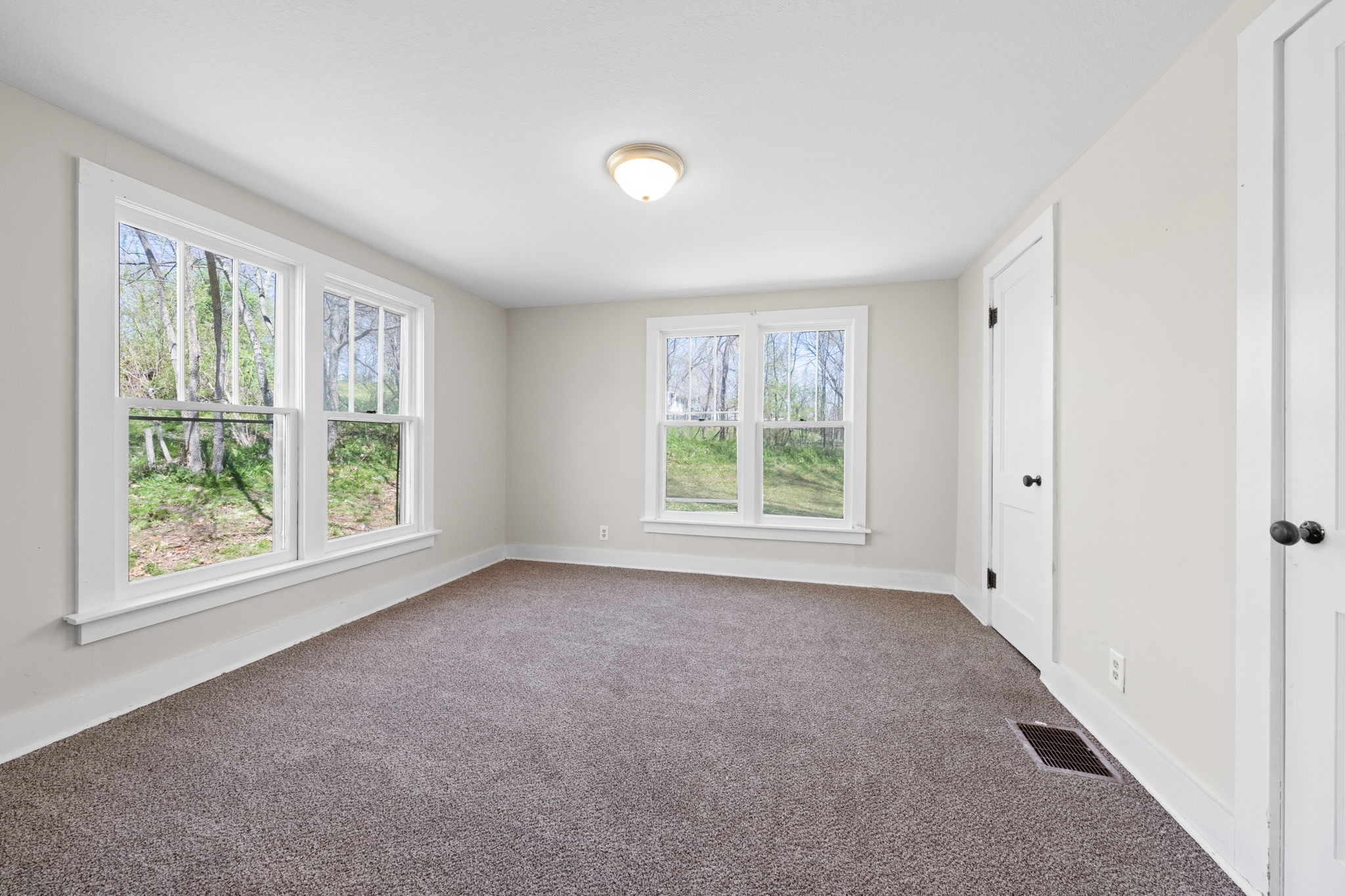 66 Monroe Street Cadiz, KY 42211 - Photo 14 of 15 an empty room with windows and closet