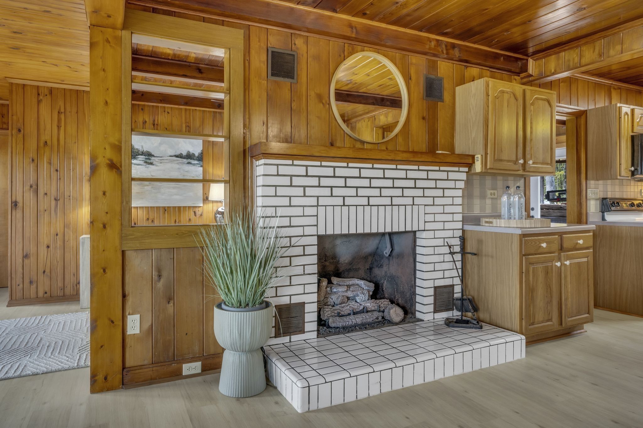 90 Bluff Point Lane Waverly, TN 37185 - Photo 15 of 60 a living room with a fireplace and a wooden floor