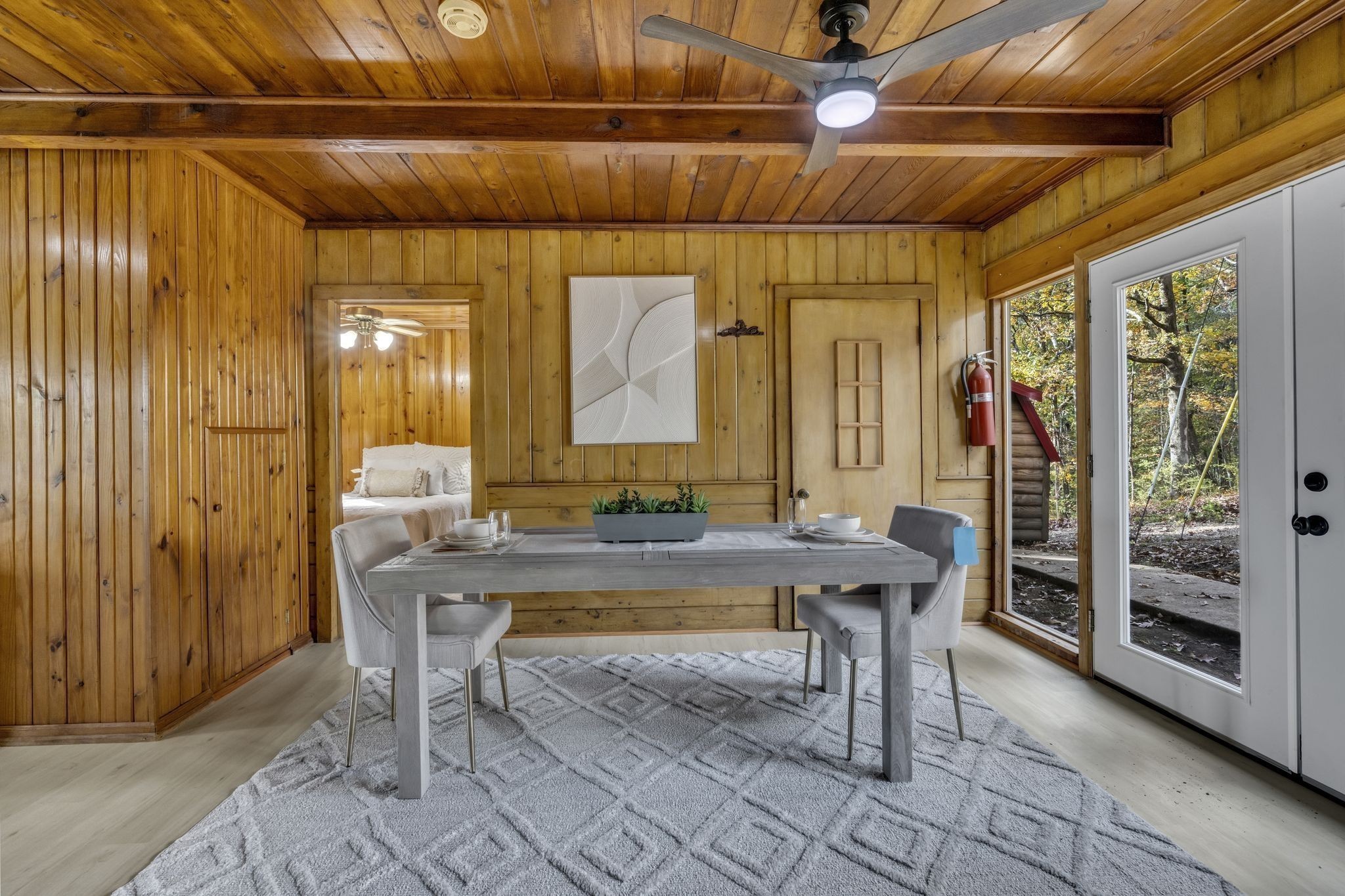 90 Bluff Point Lane Waverly, TN 37185 - Photo 16 of 60 a room with lots of wooden furniture and a glass door