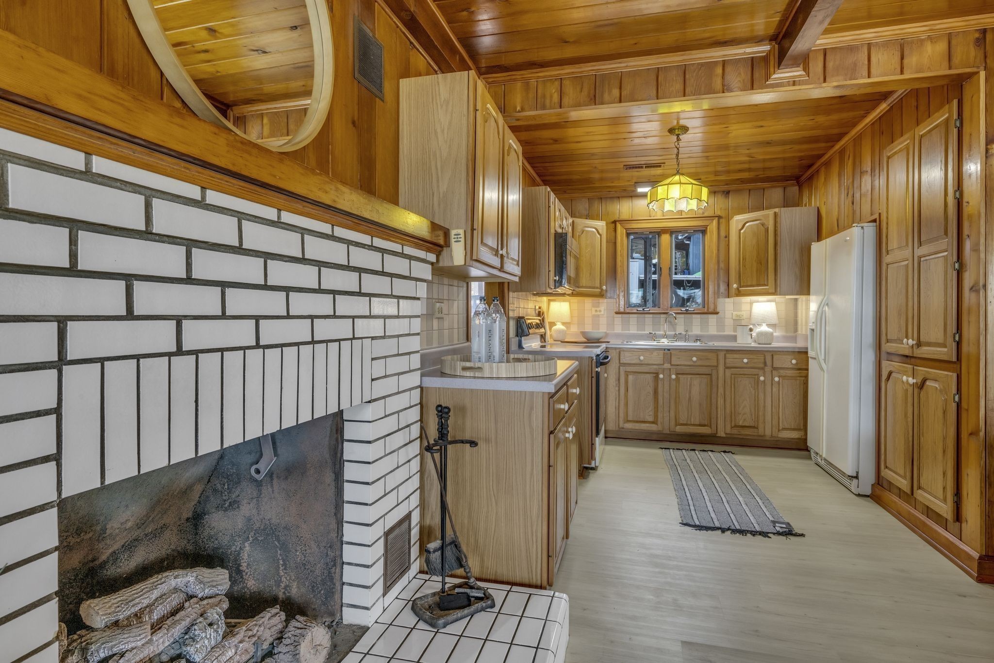 90 Bluff Point Lane Waverly, TN 37185 - Photo 27 of 60 a kitchen with a sink and cabinets