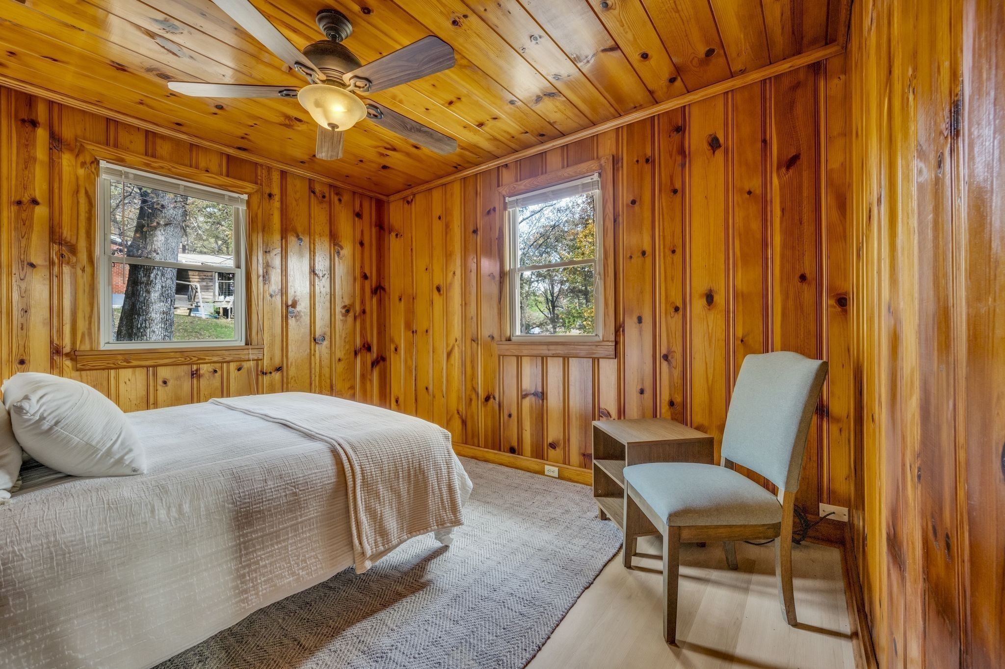 90 Bluff Point Lane Waverly, TN 37185 - Photo 31 of 60 a bedroom with a bed chair and painting on the wall