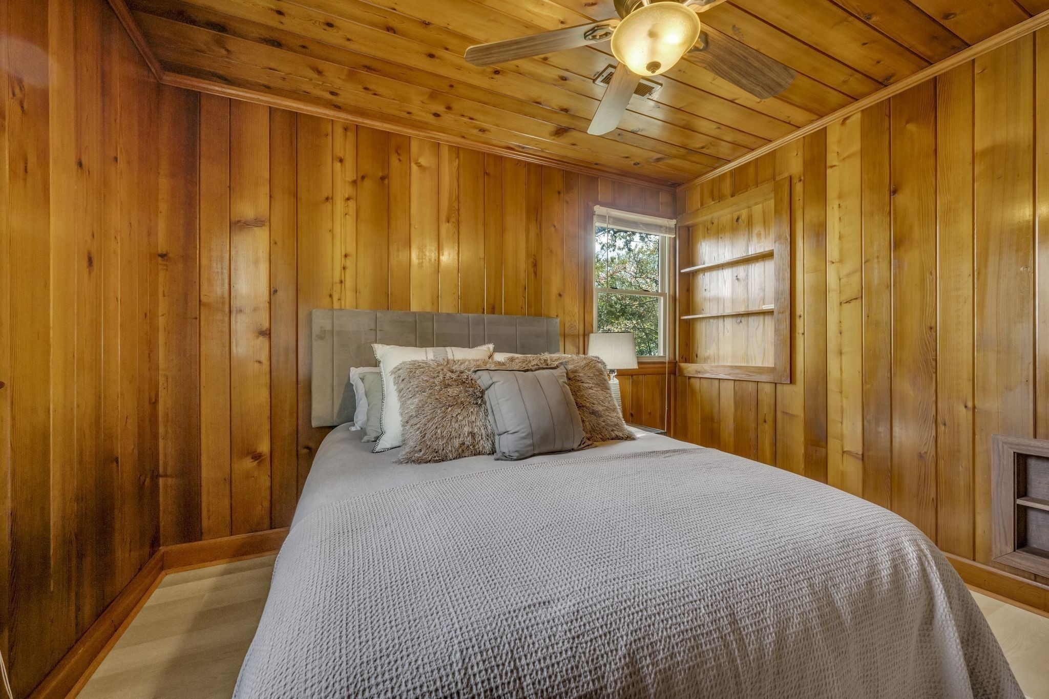 90 Bluff Point Lane Waverly, TN 37185 - Photo 32 of 60 a bedroom with a bed and a window