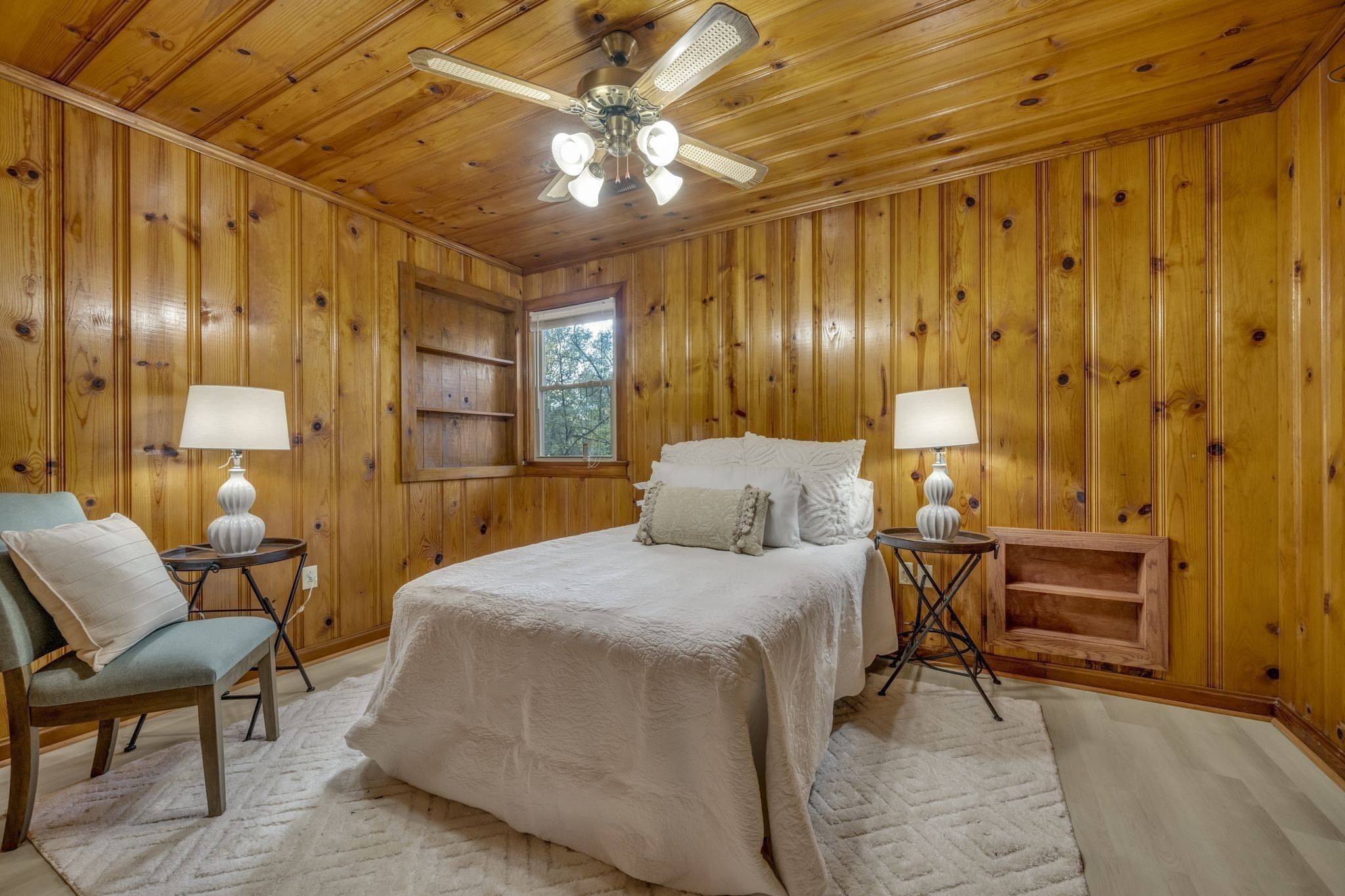 90 Bluff Point Lane Waverly, TN 37185 - Photo 36 of 60 a spacious bedroom with a bed a table and chair