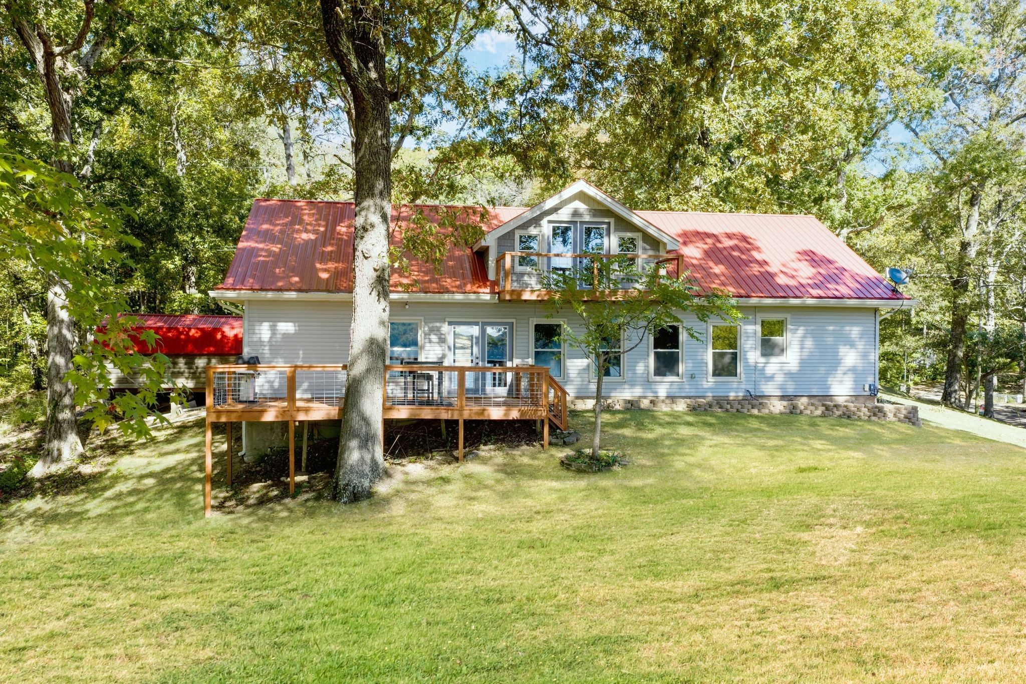 90 Bluff Point Lane Waverly, TN 37185 - Photo 42 of 60 a view of a house with swimming pool and sitting area