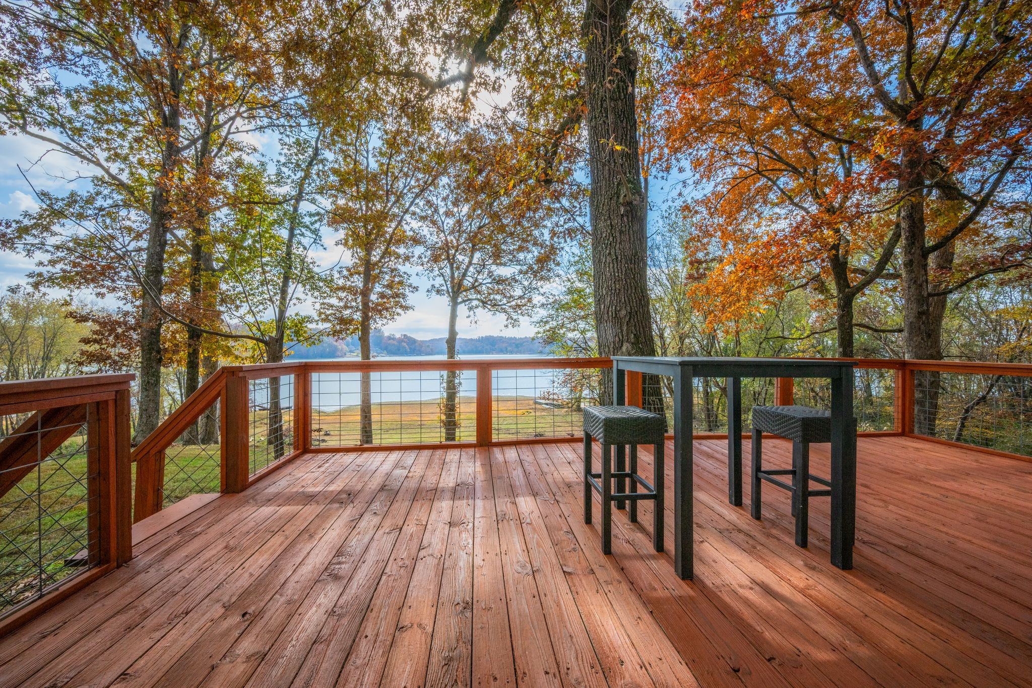 90 Bluff Point Lane Waverly, TN 37185 - Photo 43 of 60 a view of balcony with wooden floor and fence