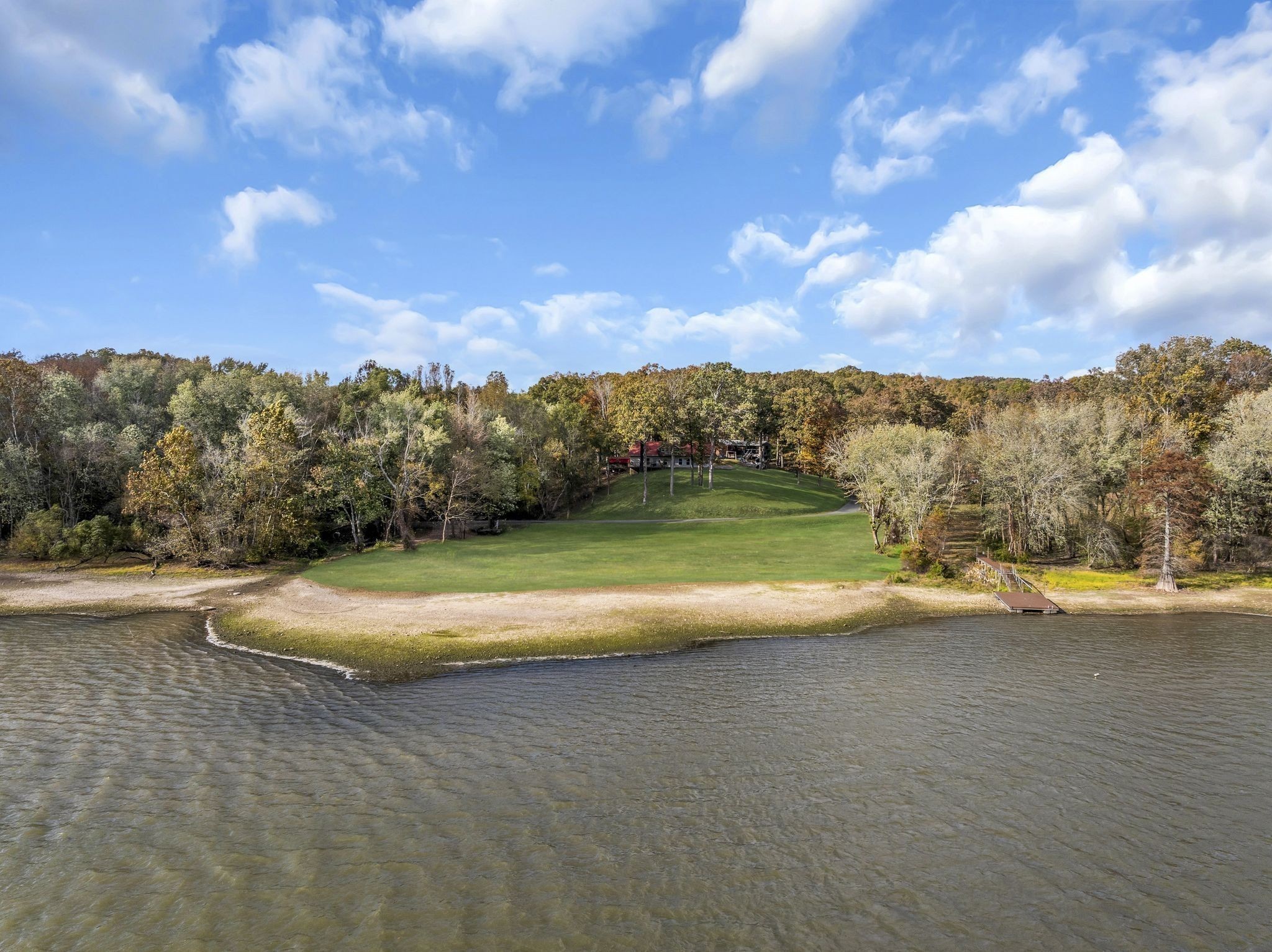 90 Bluff Point Lane Waverly, TN 37185 - Photo 50 of 60 a view of a lake with a city