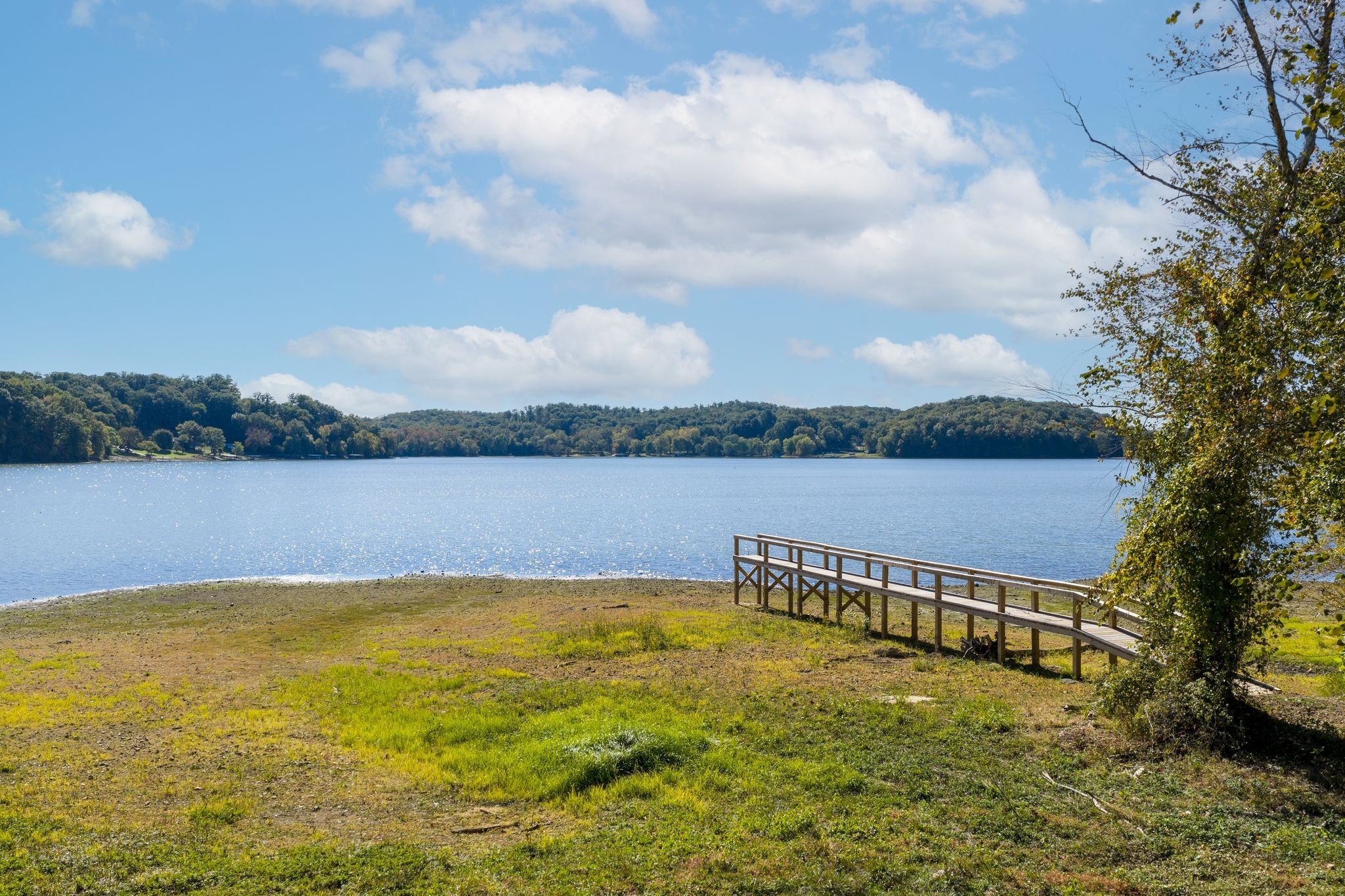 90 Bluff Point Lane Waverly, TN 37185 - Photo 58 of 60 a view of a lake with houses in the back