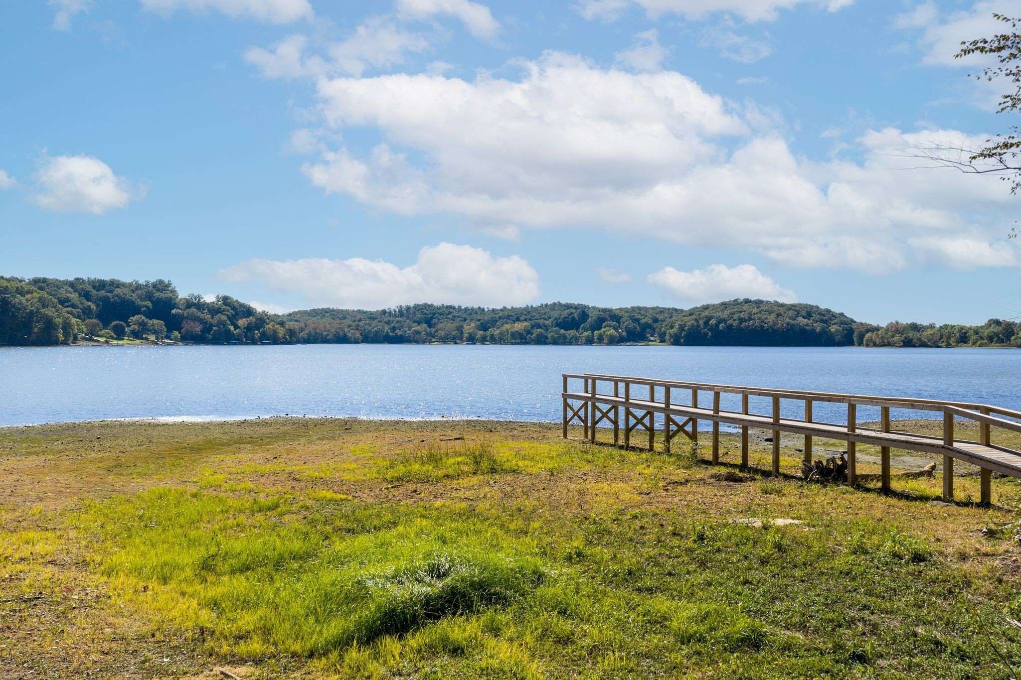 90 Bluff Point Lane Waverly, TN 37185 - Photo 59 of 60 a view of a lake with houses in the back