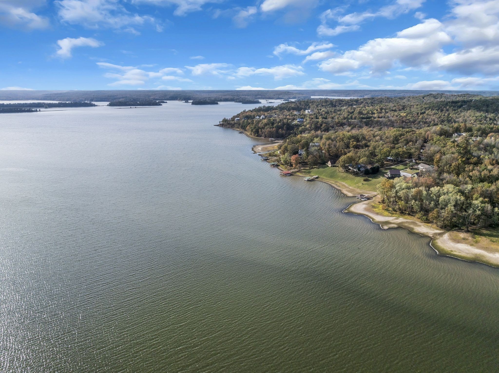 90 Bluff Point Lane Waverly, TN 37185 - Photo 6 of 60 a view of a lake with a city