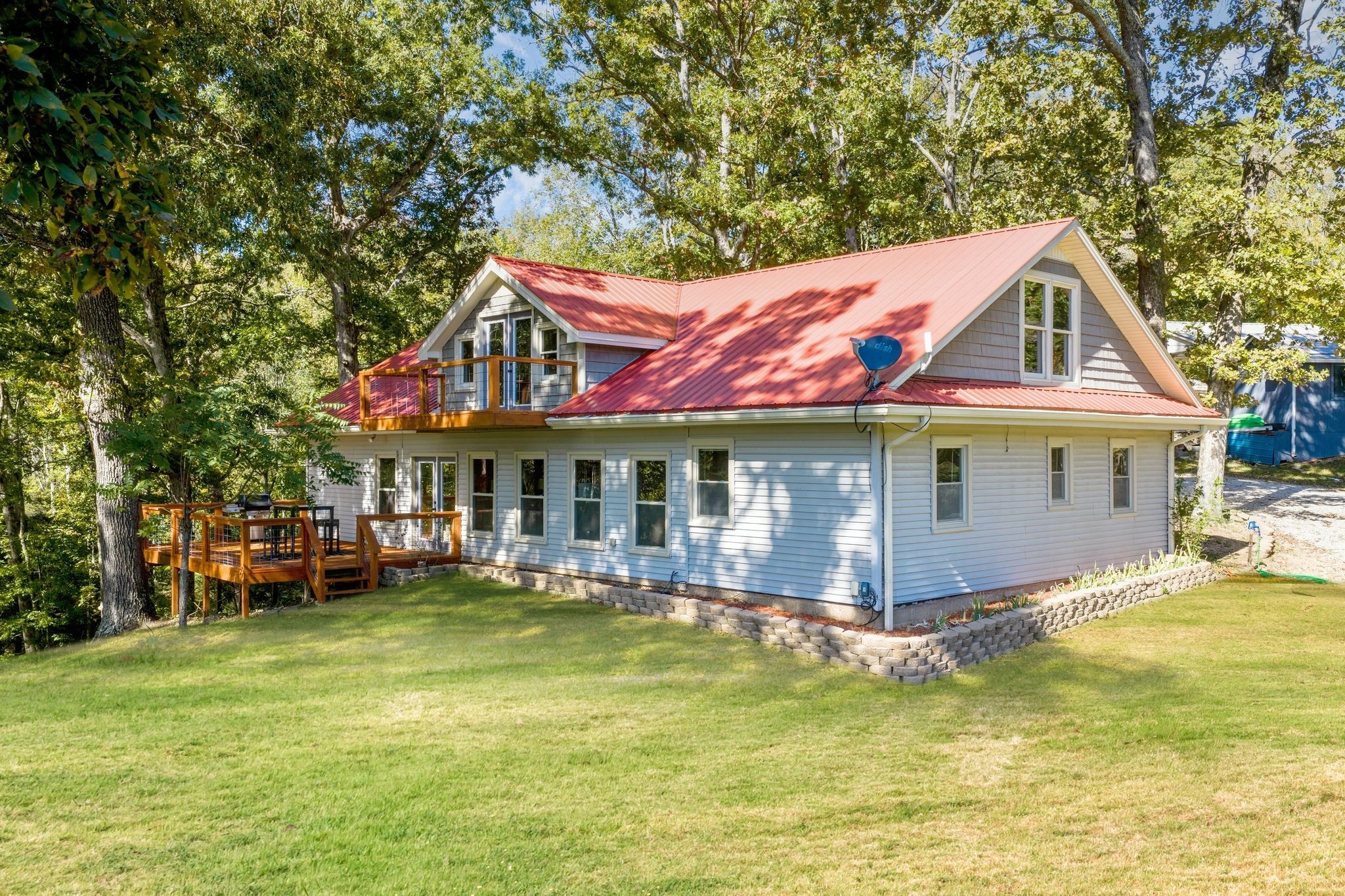 90 Bluff Point Lane Waverly, TN 37185 - Photo 7 of 60 a view of a house with a swimming pool