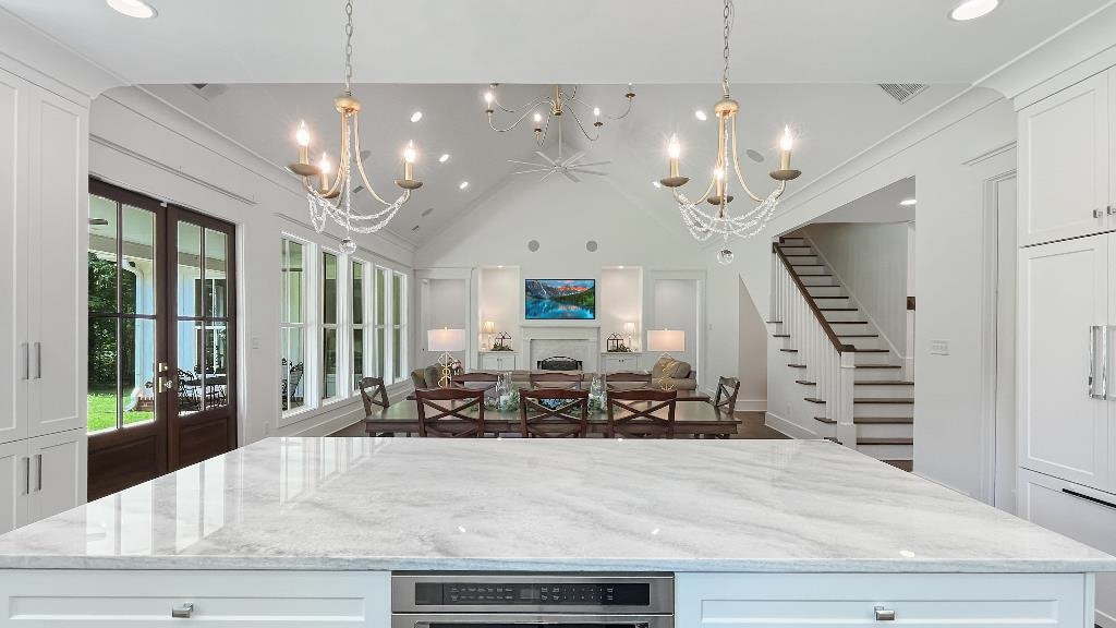 335 Blain Road Rossville, TN 38066 - Photo 13 of 38 a view of a dining room with furniture chandelier and wooden floor