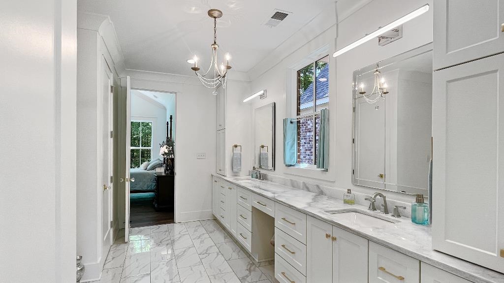 335 Blain Road Rossville, TN 38066 - Photo 19 of 38 a spacious bathroom with a granite countertop sink a mirror and a shower
