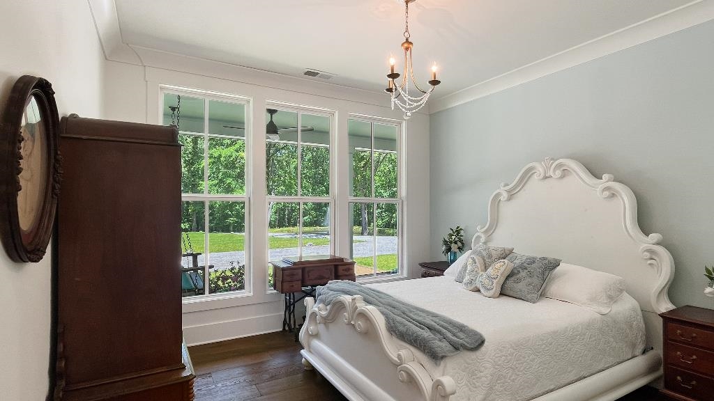 335 Blain Road Rossville, TN 38066 - Photo 27 of 38 a bedroom with a bed and a window