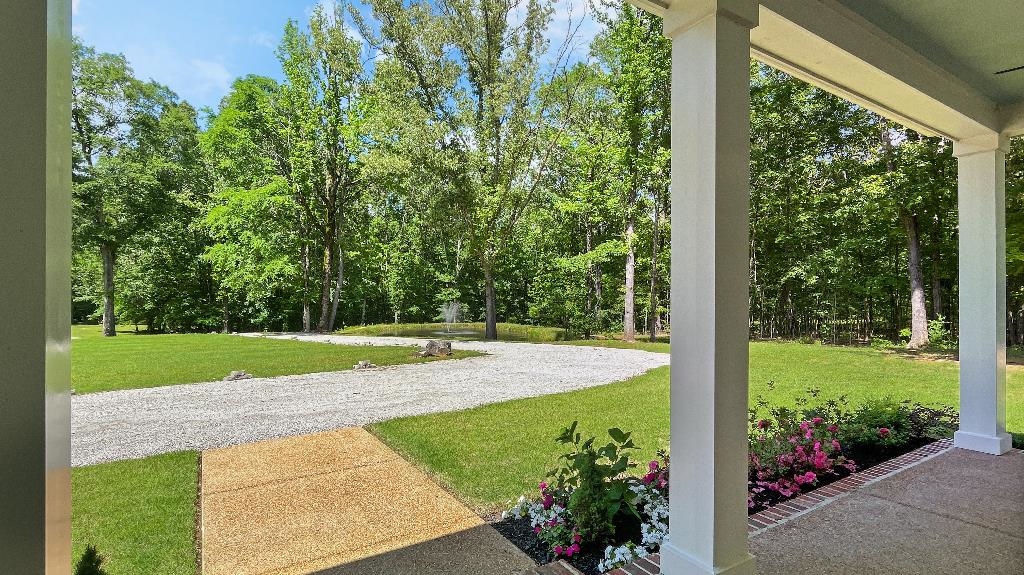 335 Blain Road Rossville, TN 38066 - Photo 33 of 38 a view of a backyard with garden