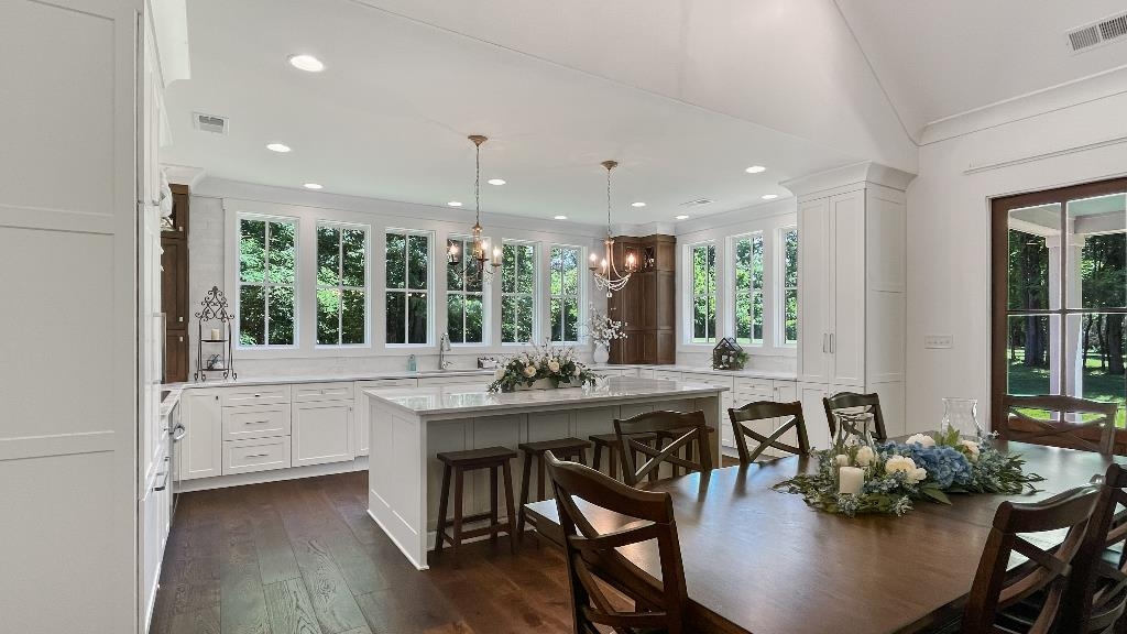 335 Blain Road Rossville, TN 38066 - Photo 9 of 38 a kitchen with a table and chairs