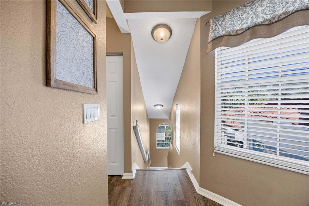 10801 Halfmoon Shoal Road, Unit 203 Estero, FL 34135 - Photo 23 of 50 a view of a hallway with entryway