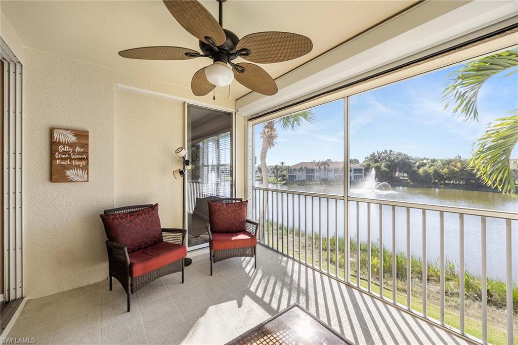 10801 Halfmoon Shoal Road, Unit 203 Estero, FL 34135 - Photo 30 of 50 a living room with furniture