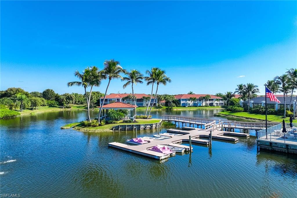 10801 Halfmoon Shoal Road, Unit 203 Estero, FL 34135 - Photo 41 of 50 a view of swimming pool with outdoor seating and yard
