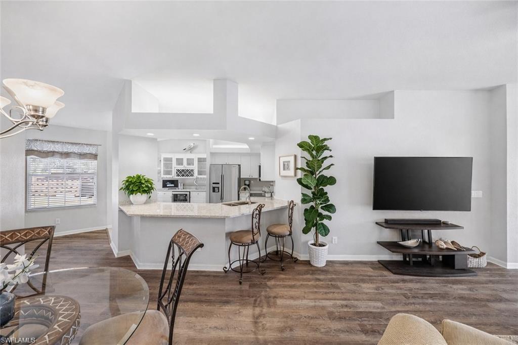 10801 Halfmoon Shoal Road, Unit 203 Estero, FL 34135 - Photo 8 of 50 Ai generated changing walls to white.