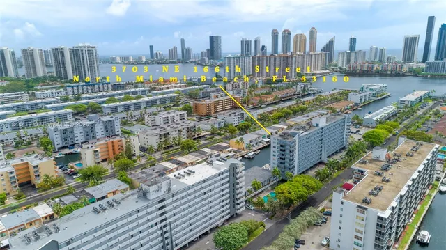 a view of a city with tall buildings
