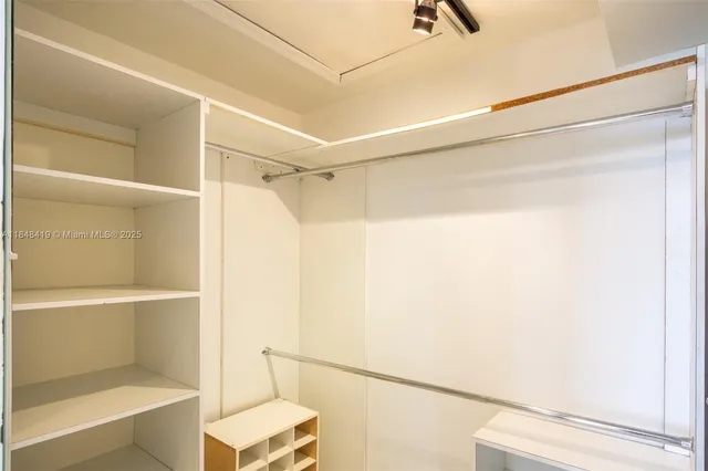 a bathroom with a shower and a toilet