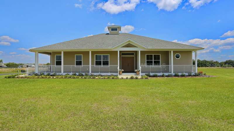 6206 Spencer Parrish Road Parrish, FL 34219 - Photo 1 of 1 Facade/Exterior Front - Living in the peace and quite of country with close proximity to the Interstate, malls, and more