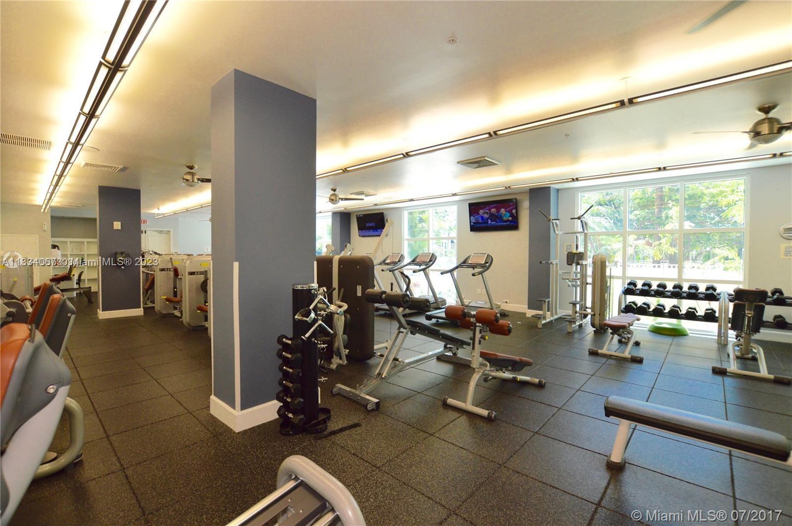 2001 Biscayne Boulevard, Unit 2503 Miami, FL 33137 - Photo 19 of 22 a view of a room with gym equipment