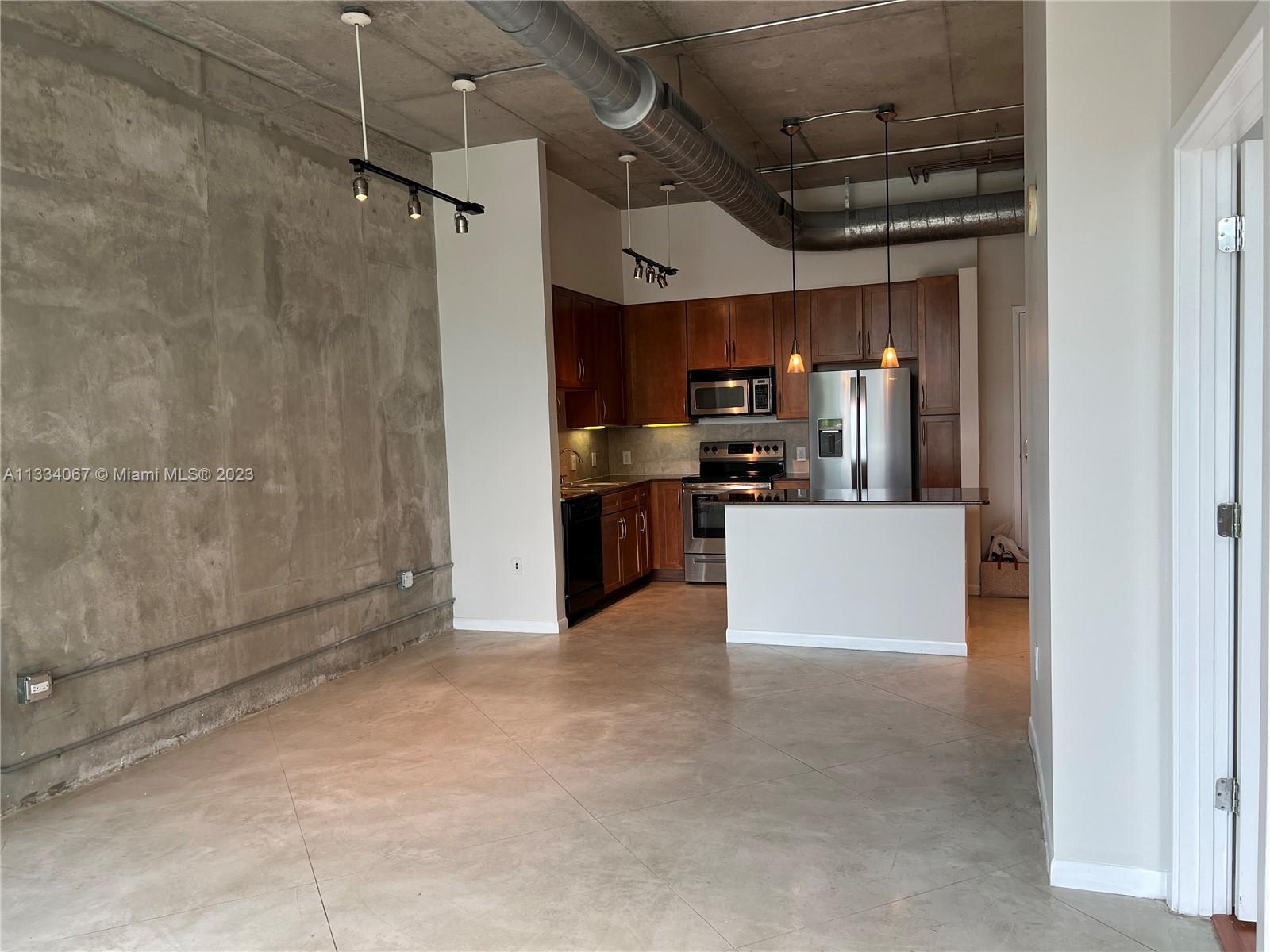 2001 Biscayne Boulevard, Unit 2503 Miami, FL 33137 - Photo 6 of 22 a view of a kitchen with a sink