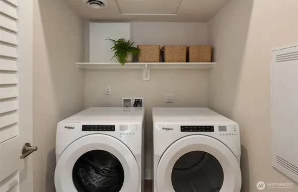 a utility room with dryer and washer