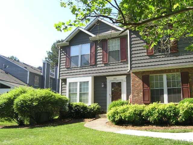 4501 Still Pines Drive Raleigh, NC 27613 - Photo 1 of 13 a front view of a house with garden