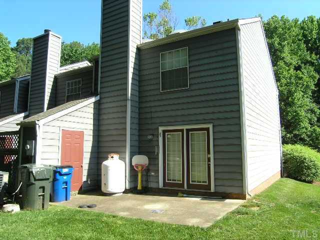 4501 Still Pines Drive Raleigh, NC 27613 - Photo 2 of 13 a view of a house with a yard and plants