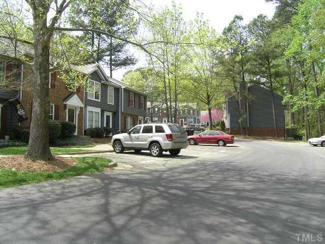 4501 Still Pines Drive Raleigh, NC 27613 - Photo 3 of 13 a view of street with parked cars