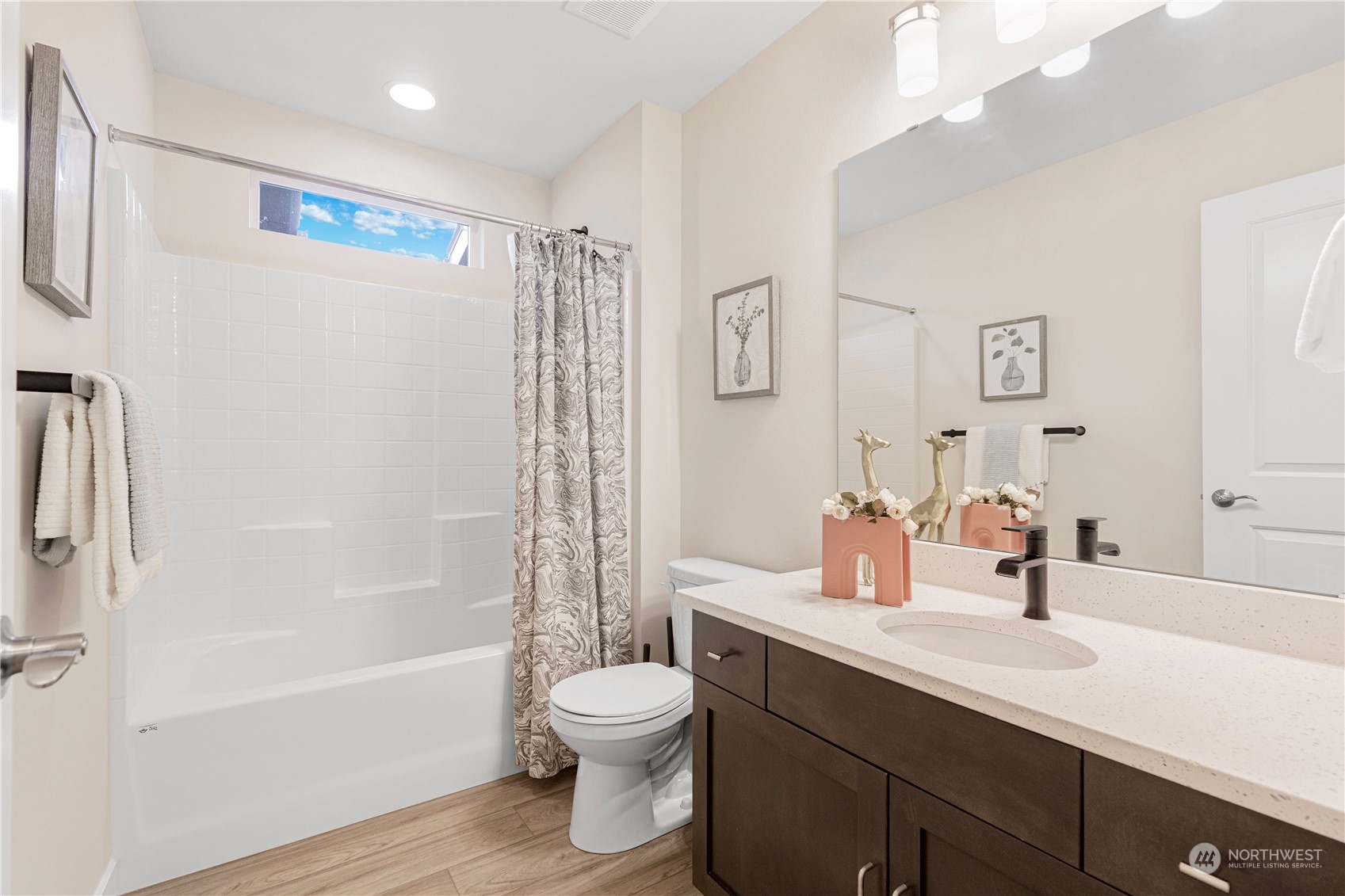 23705 8th Drive Southeast, Unit C Bothell, WA 98021 - Photo 24 of 26 a bathroom with a sink a toilet and shower