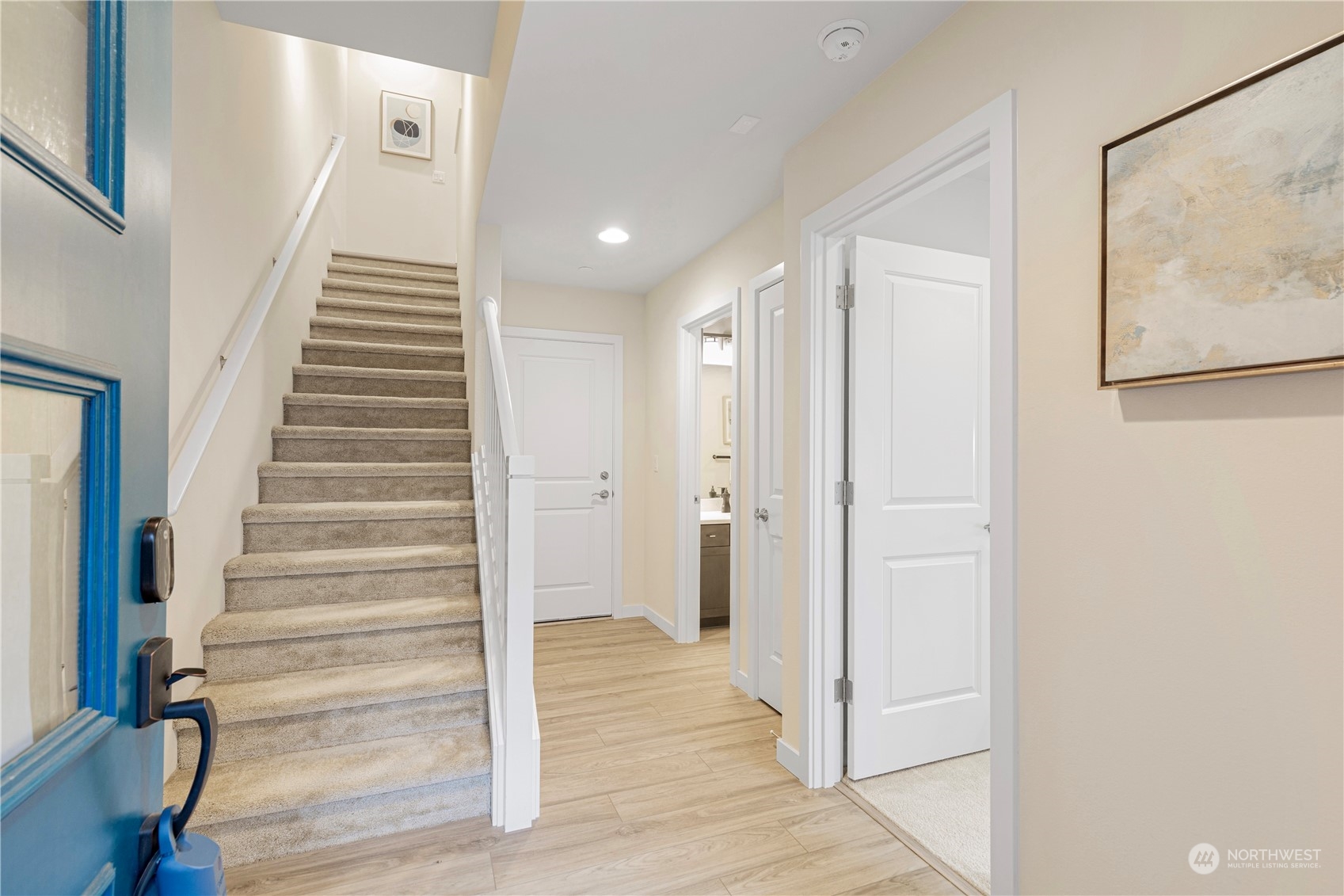 23705 8th Drive Southeast, Unit C Bothell, WA 98021 - Photo 4 of 26 a view of a hallway with entryway and wooden floor