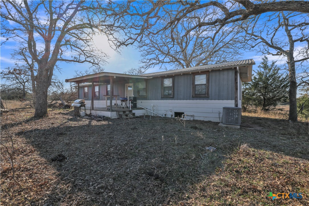 895 Patterson Road Flatonia, TX 78941 - Photo 3 of 21 a view of a house with a yard