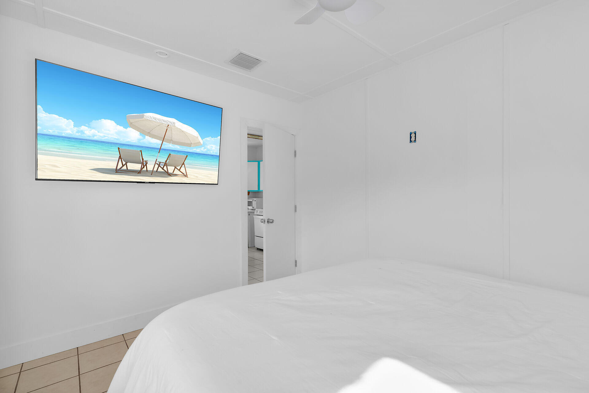 20 Palm Drive Key Largo, FL 33037 - Photo 12 of 47 a bedroom with a bed and a window