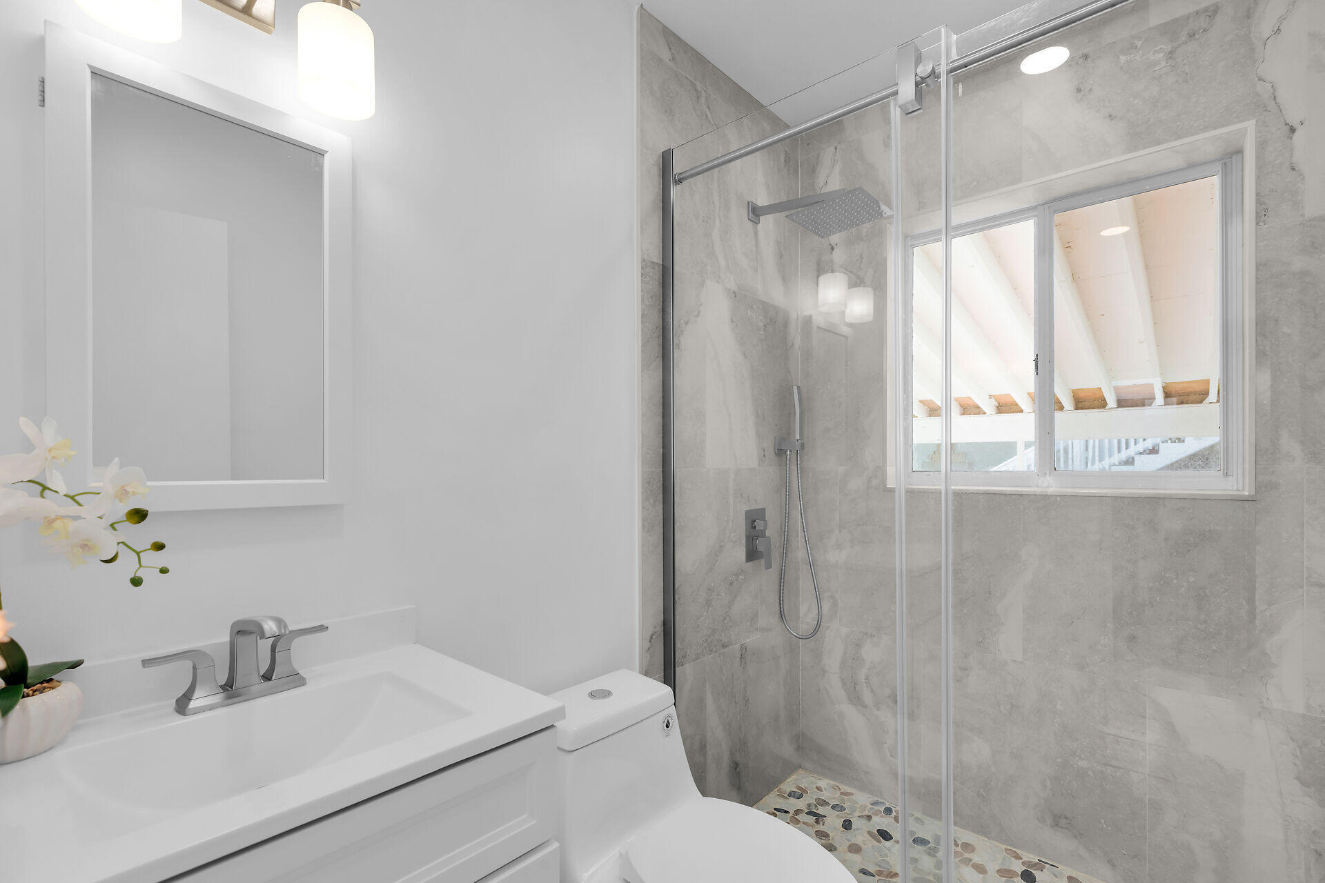 20 Palm Drive Key Largo, FL 33037 - Photo 13 of 47 a bathroom with a sink and a mirror