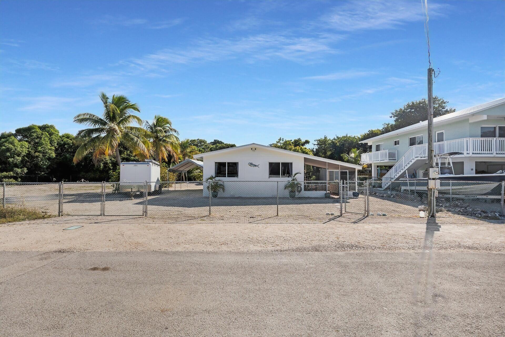 20 Palm Drive Key Largo, FL 33037 - Photo 27 of 47 a house with a outdoor space