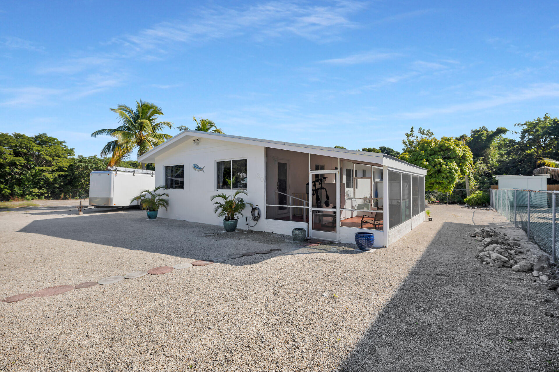 20 Palm Drive Key Largo, FL 33037 - Photo 29 of 47 a view of a house with backyard and porch