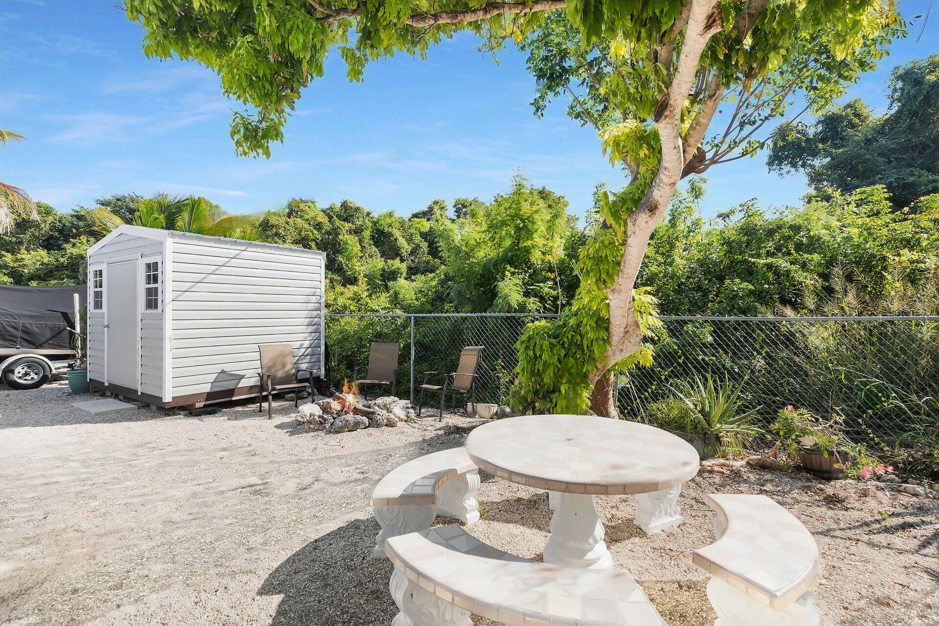 20 Palm Drive Key Largo, FL 33037 - Photo 32 of 47 a view of outdoor space and patio