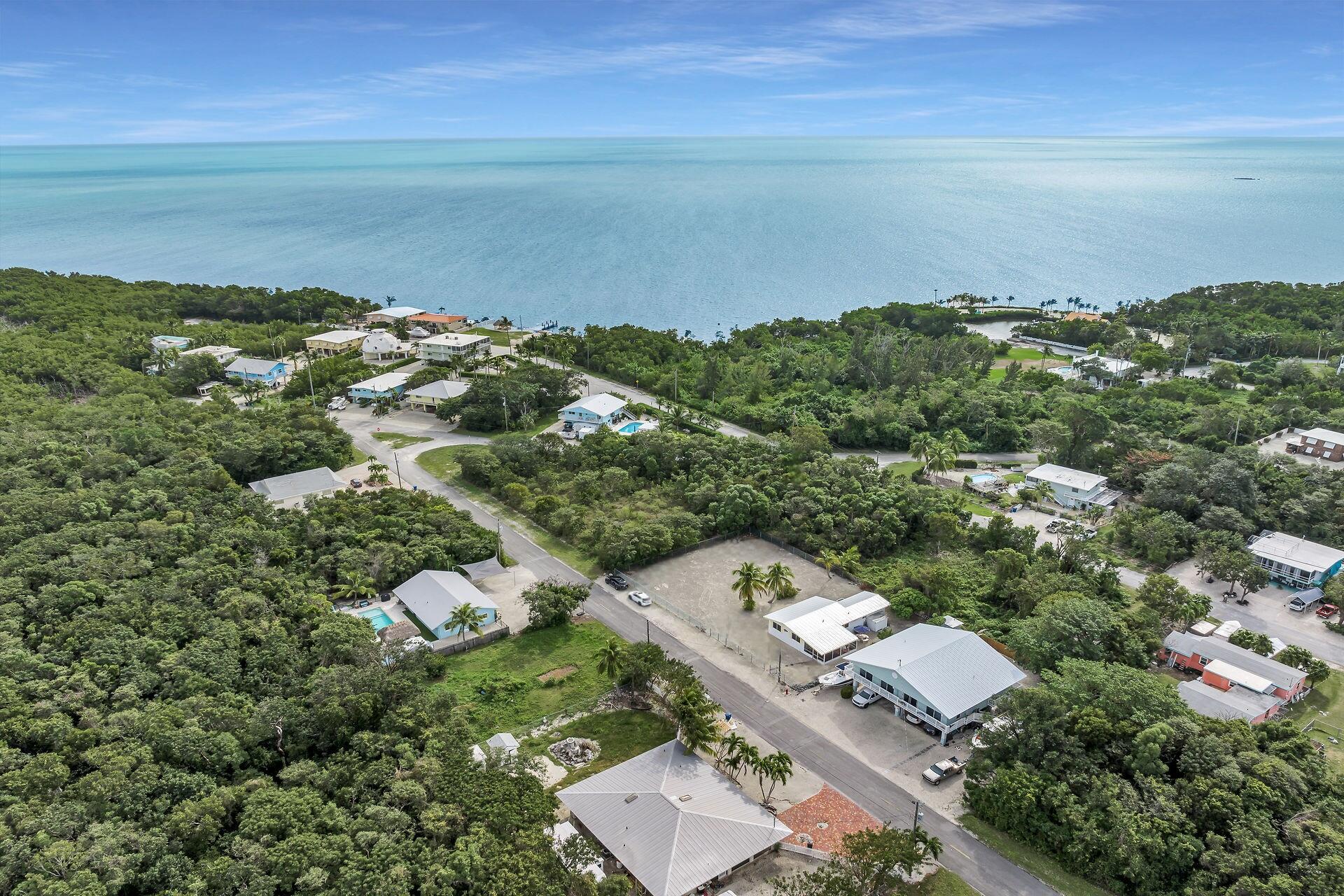 20 Palm Drive Key Largo, FL 33037 - Photo 39 of 47 an aerial view of a house with a lake view