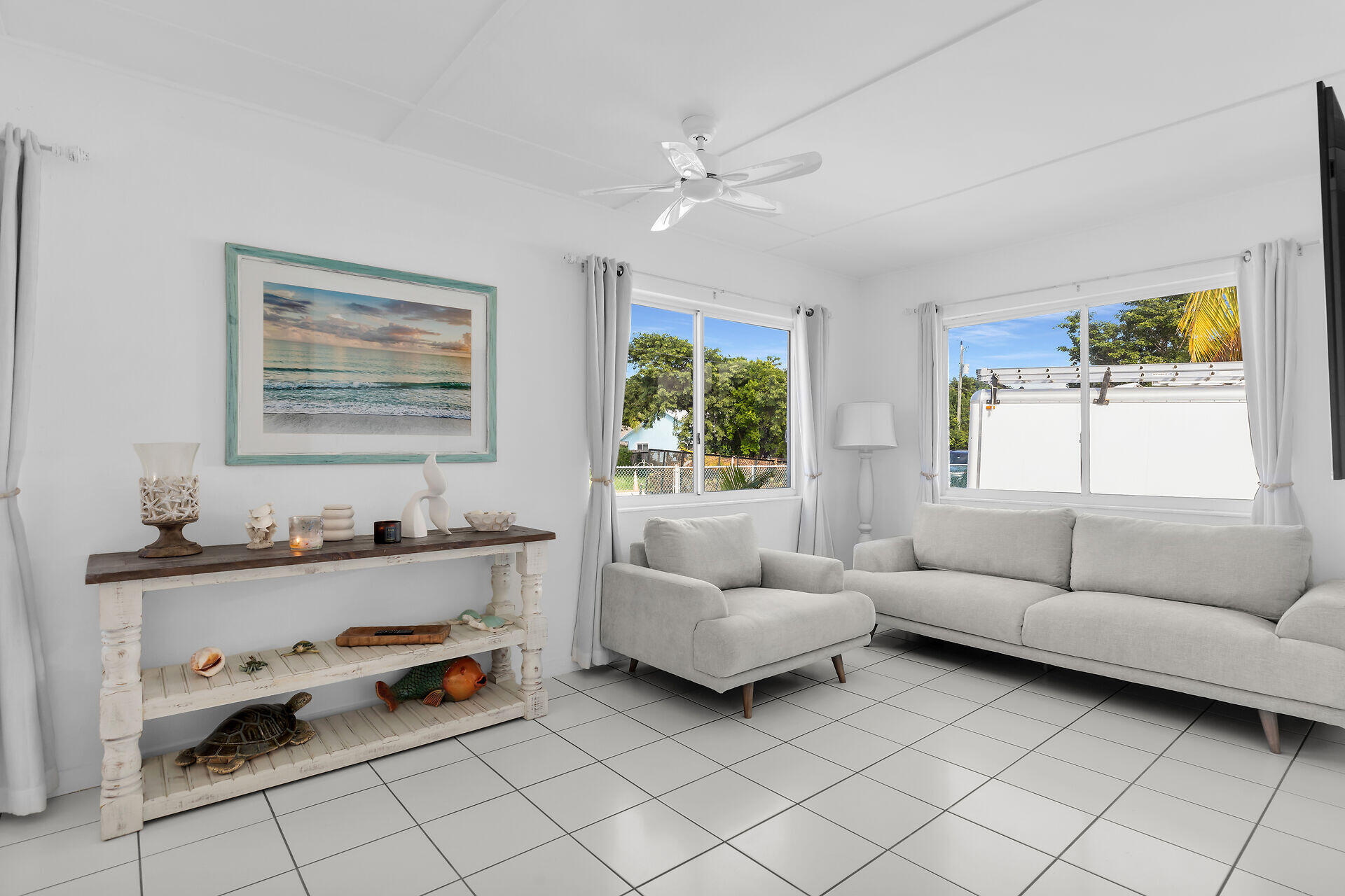 20 Palm Drive Key Largo, FL 33037 - Photo 4 of 47 a living room with furniture and decor