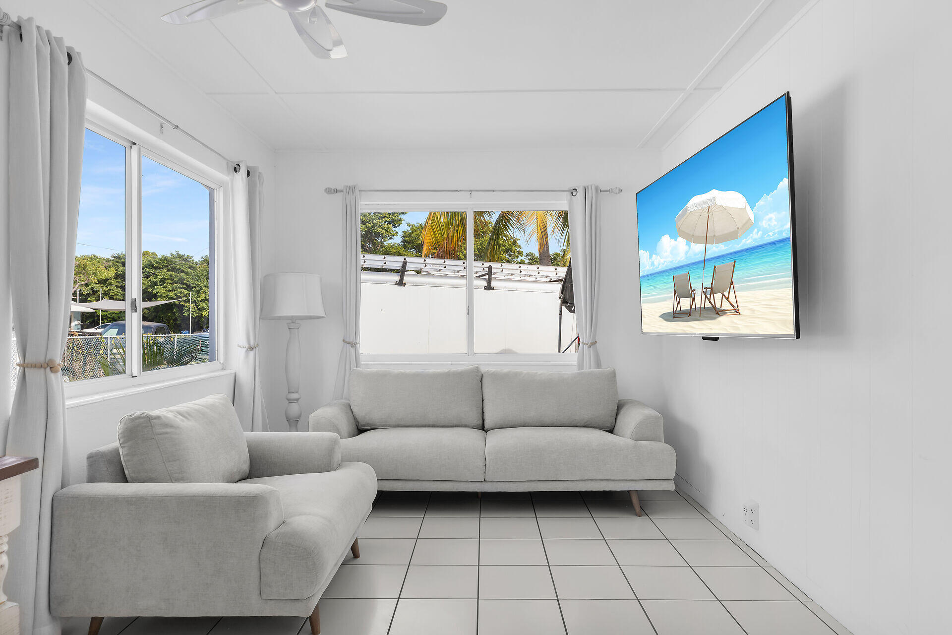 20 Palm Drive Key Largo, FL 33037 - Photo 7 of 47 a living room with furniture and a window
