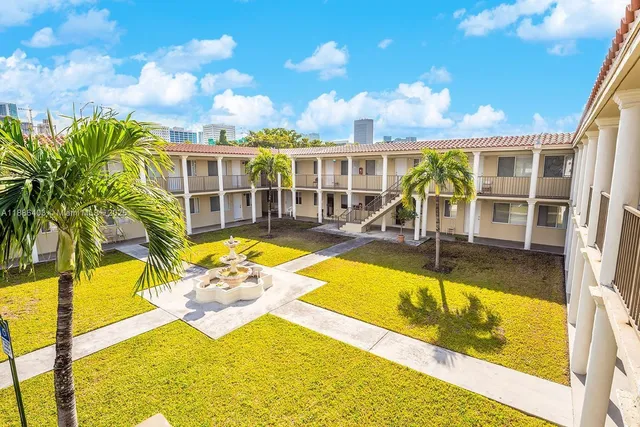 a view of a house with swimming pool