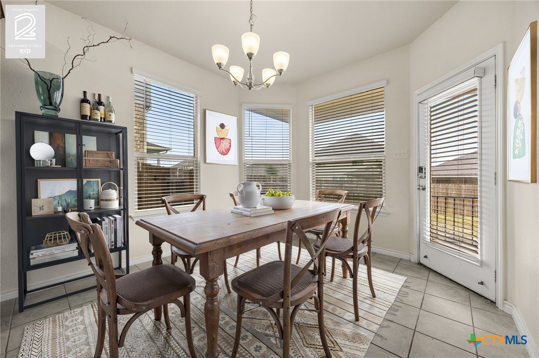 5927 Galveston Road Belton, TX 76513 - Photo 14 of 39 a view of a dining room with furniture window and outside view