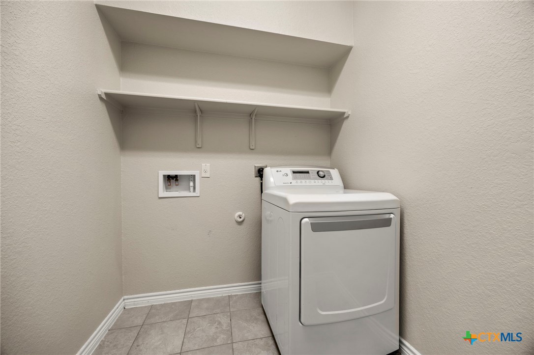 5927 Galveston Road Belton, TX 76513 - Photo 17 of 39 a utility room with dryer and washer