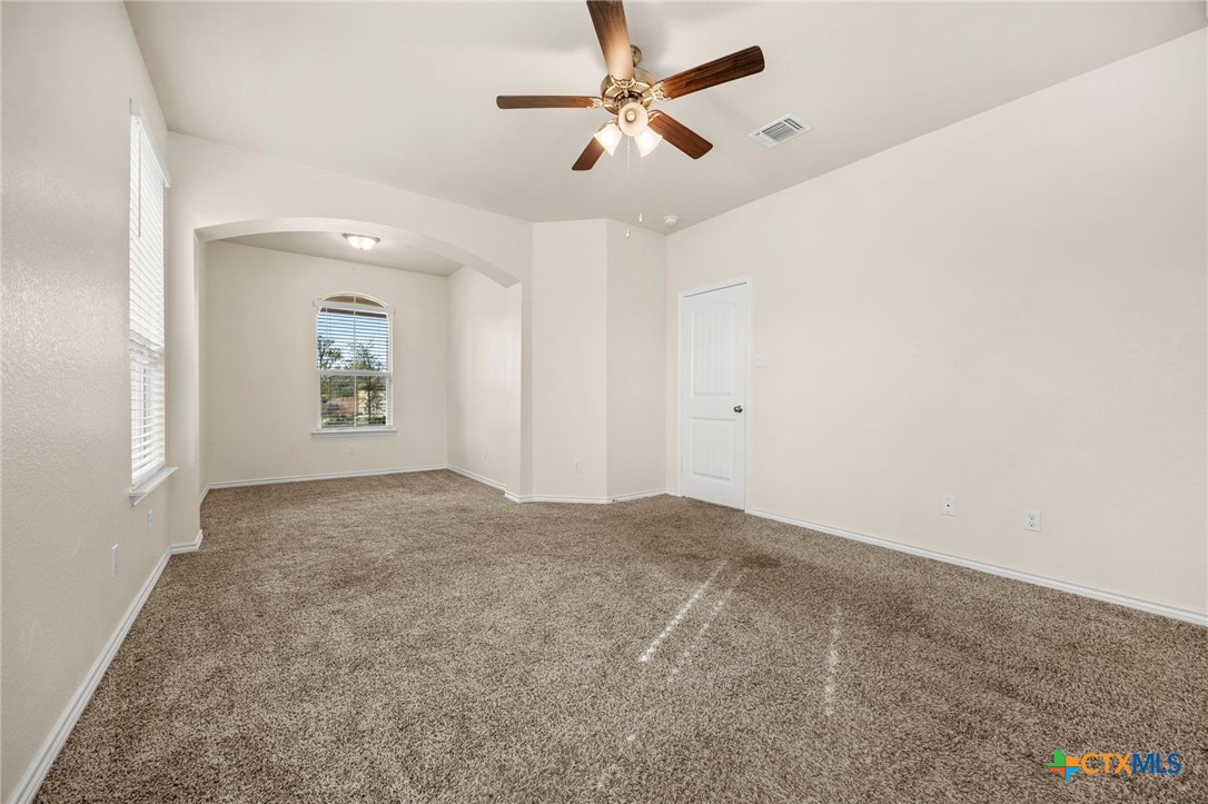 5927 Galveston Road Belton, TX 76513 - Photo 20 of 39 an empty room with fan and windows