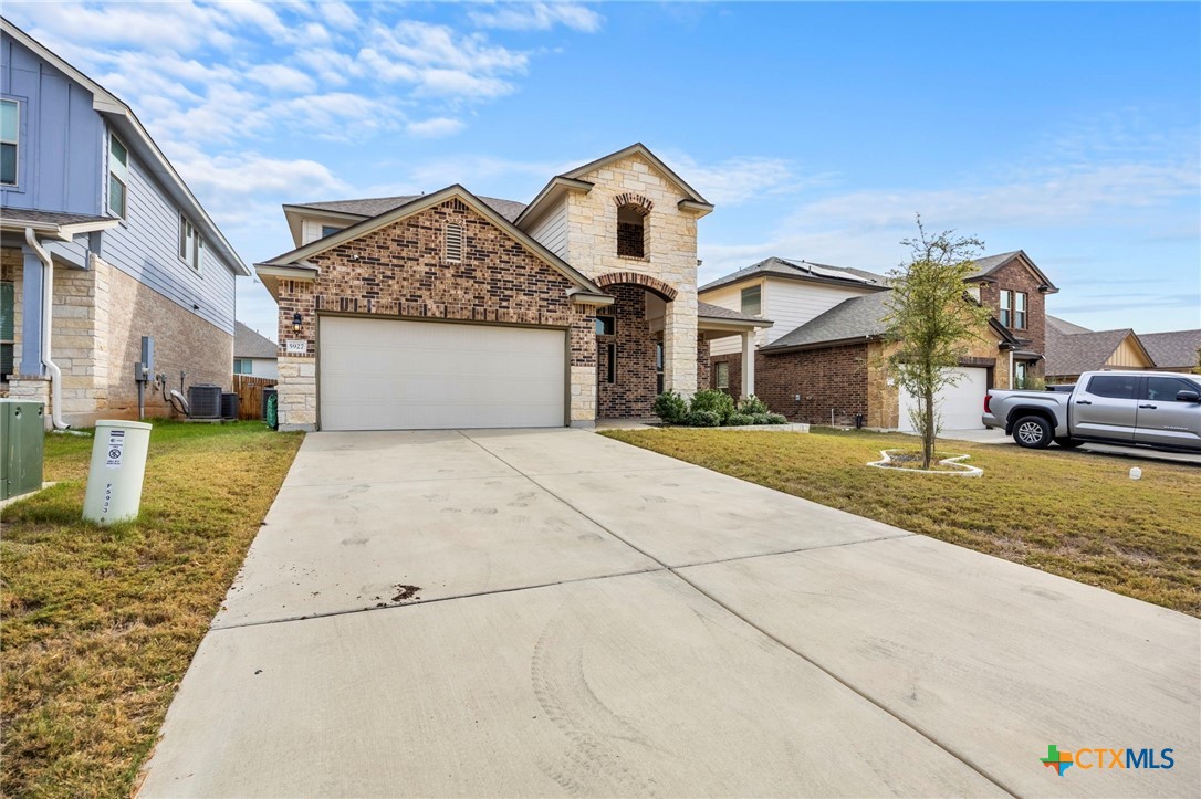 5927 Galveston Road Belton, TX 76513 - Photo 2 of 39 a front view of a house with a yard