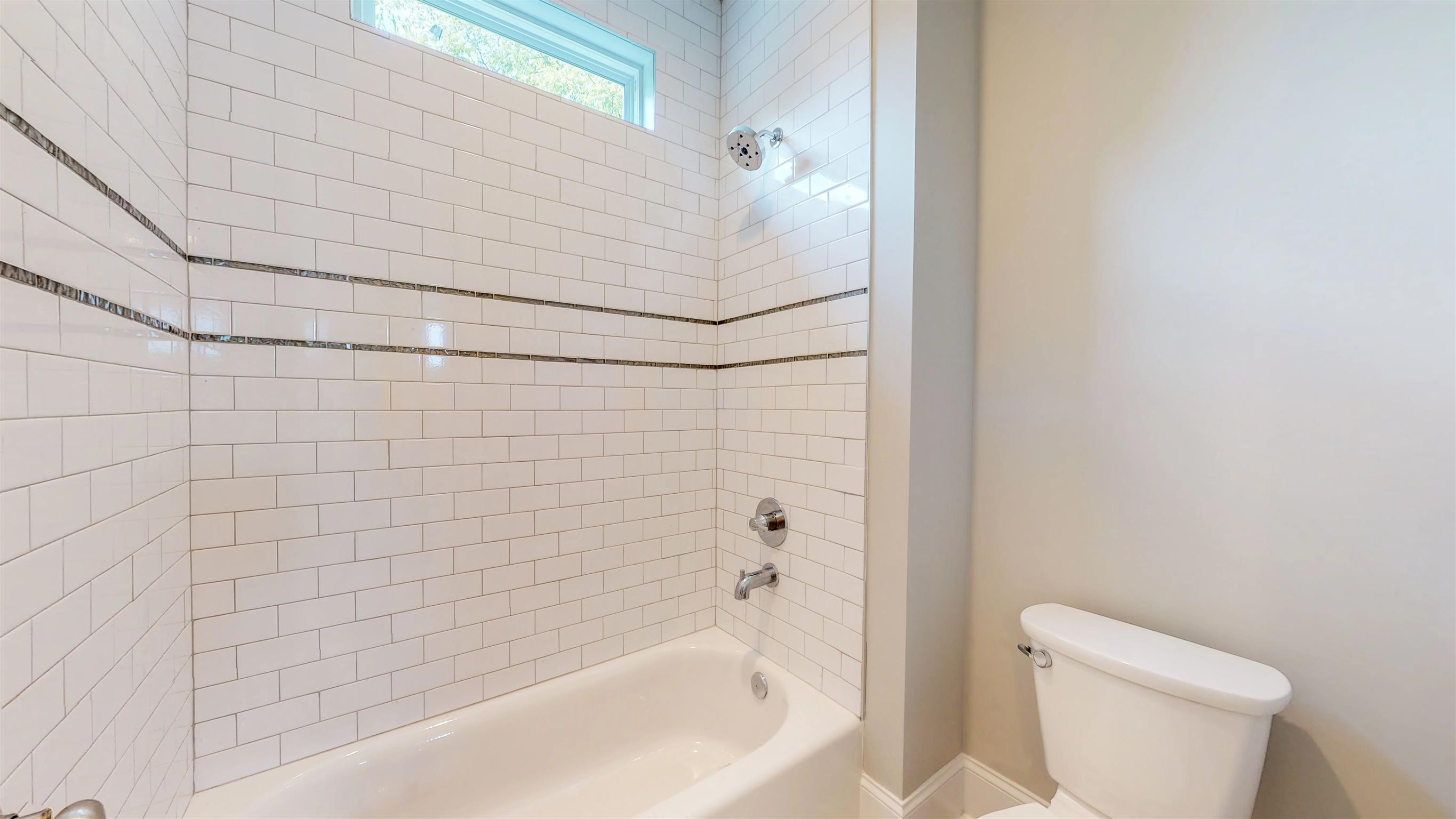 2417 B Porter Road Nashville, TN 37206 - Photo 16 of 21 Full bathroom on 2nd floor with tile surround tub/shower combo