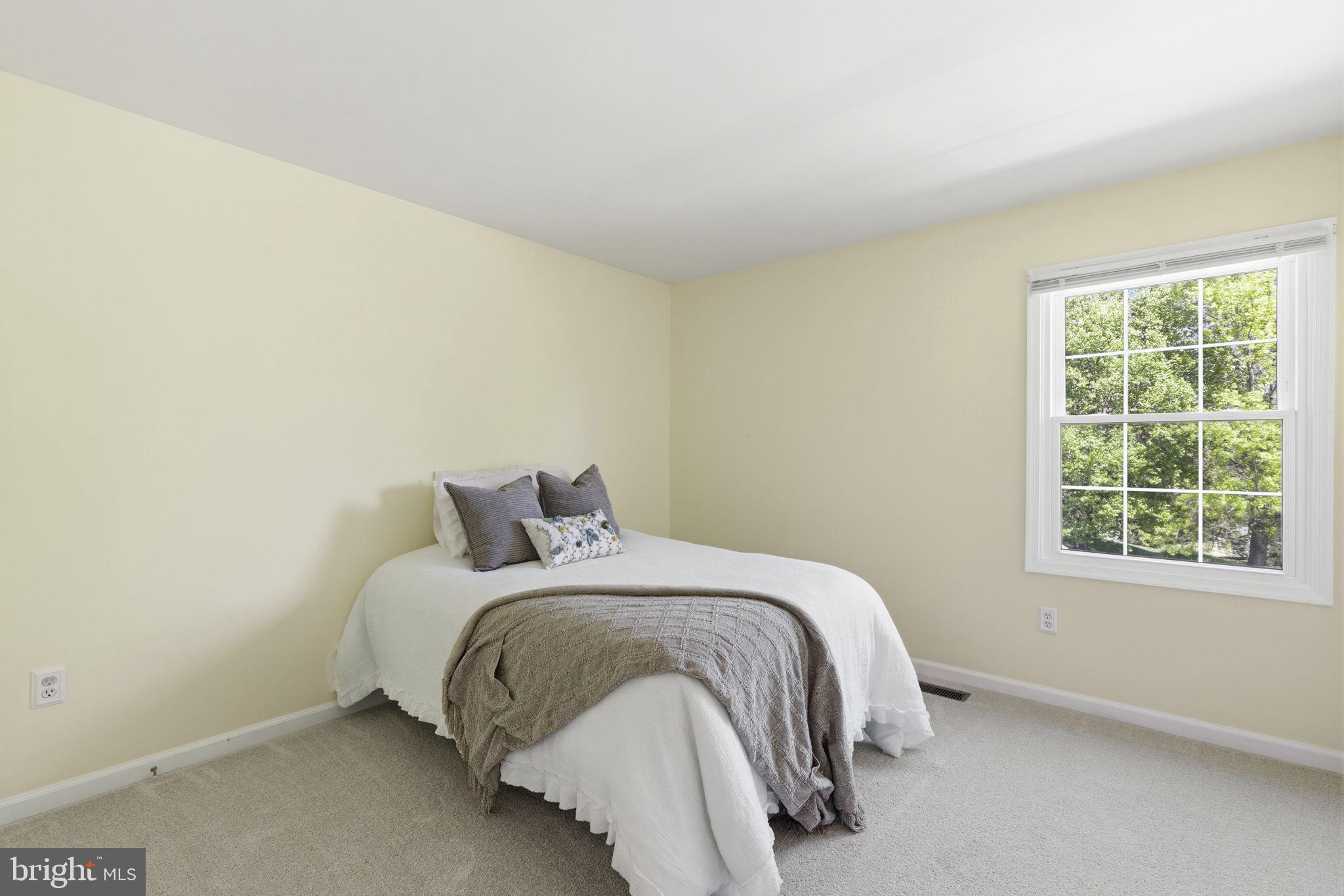 533 Inglewood Road Bel Air, MD 21015 - Photo 26 of 52 a bed sitting in a bedroom next to a window